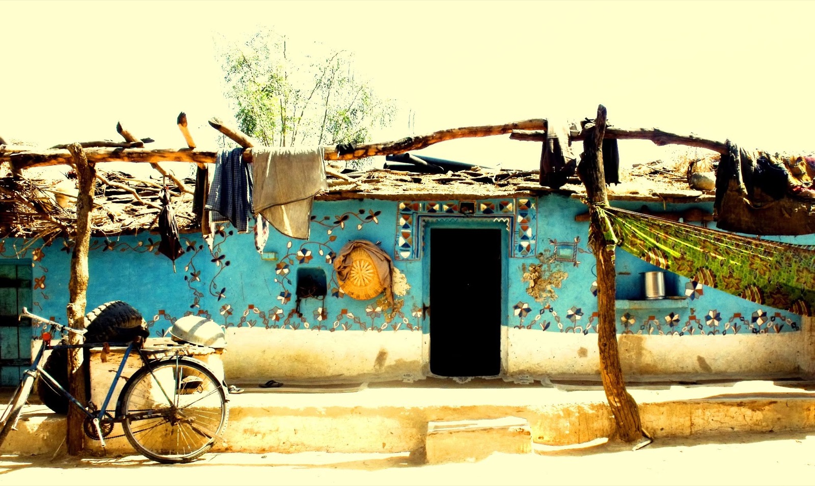 A hand-painted blue Adivasi home in Jharkhand